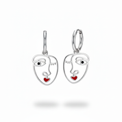 Abstract Face Earrings – Silver Black Pupils
