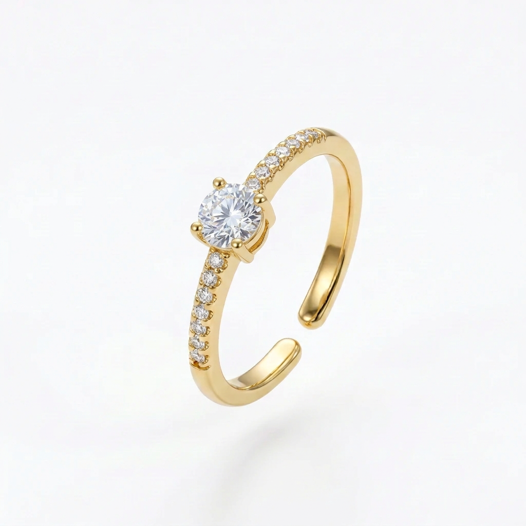 Anello dorato con pietra centrale più piccola