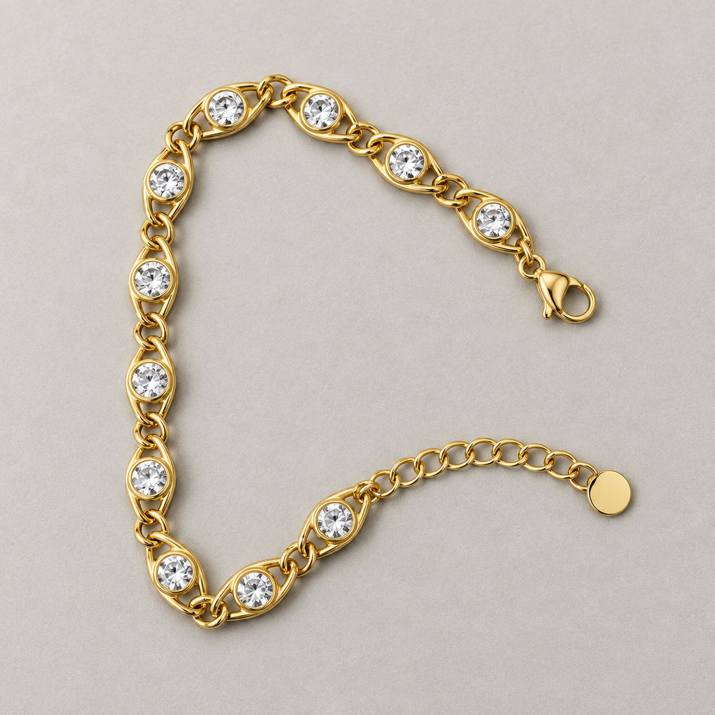 Bracciale dorato con pietre chiare