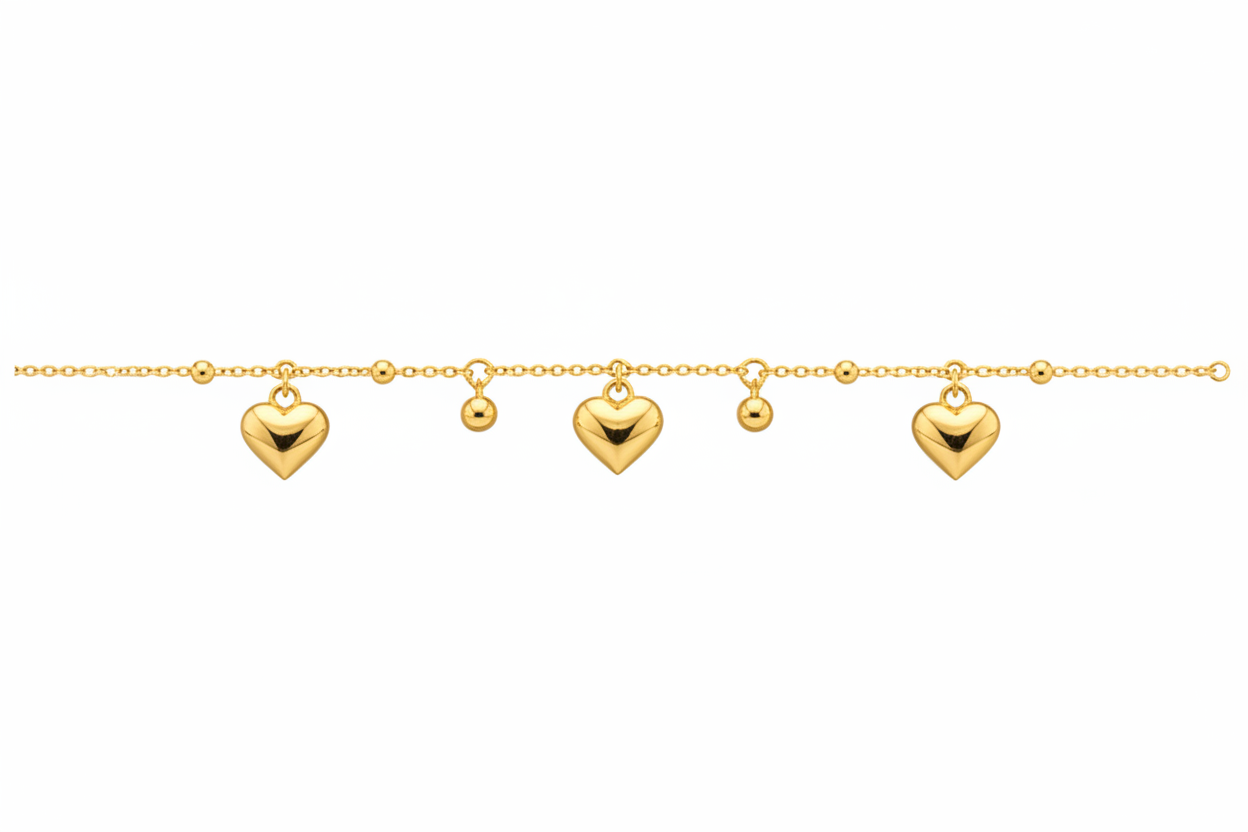 Bracciale in oro con cuori e sfere