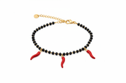 Bracciale oro perline nere 3 cornetti rossi - dettaglio