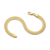 Bracciale oro su sfondo bianco