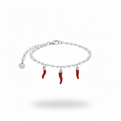 Bracciale perle e cornetti - versione argento