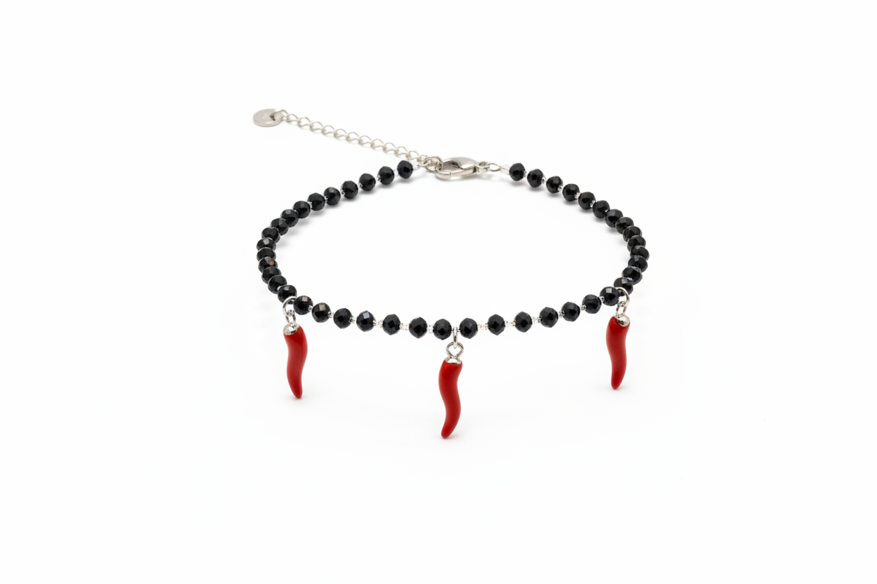 Bracciale perline nere 3 cornetti rossi - vista laterale