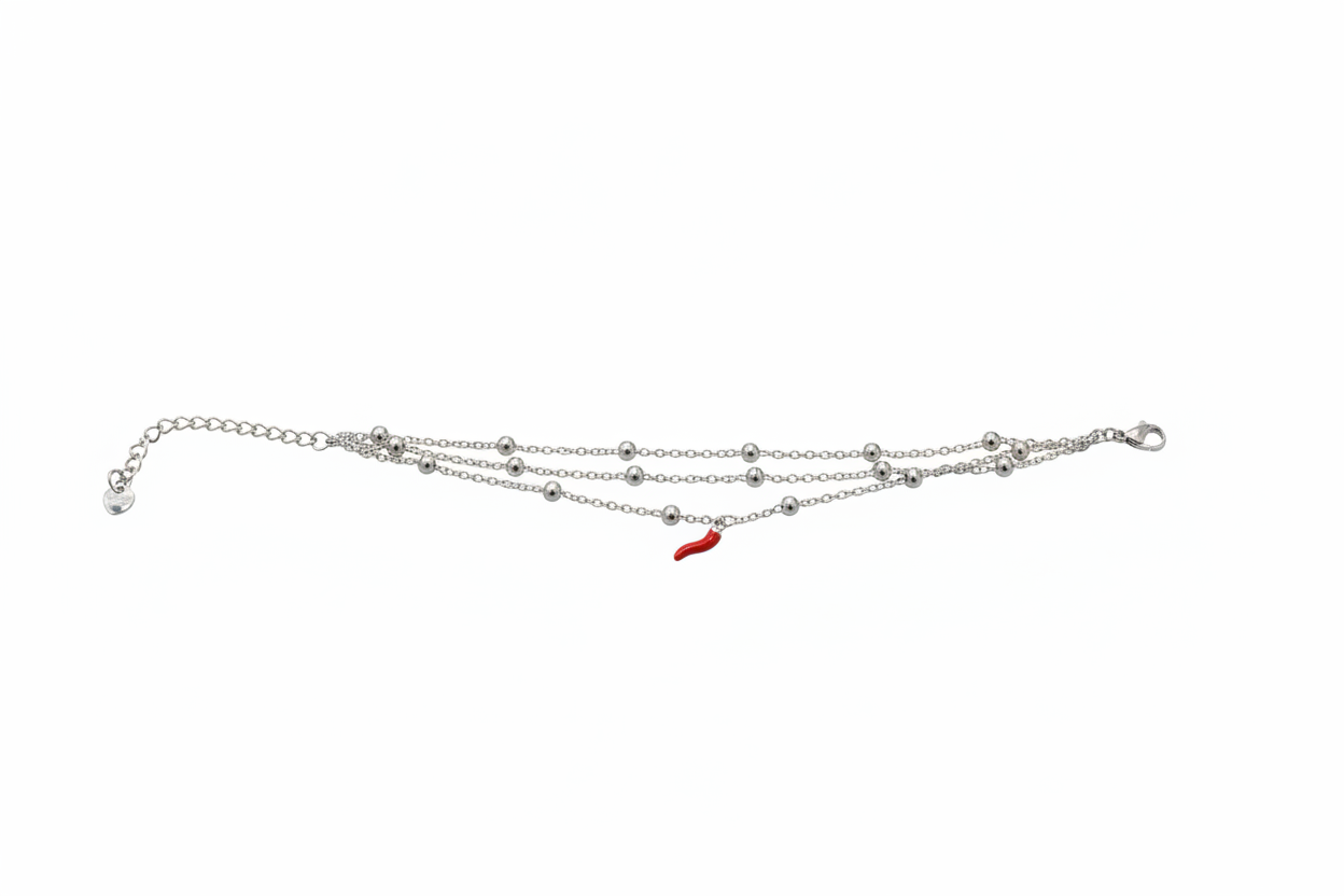 Bracciale tre catenine con cornetto sulla catena centrale - dettaglio