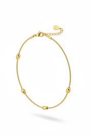 Cavigliera oro verticale