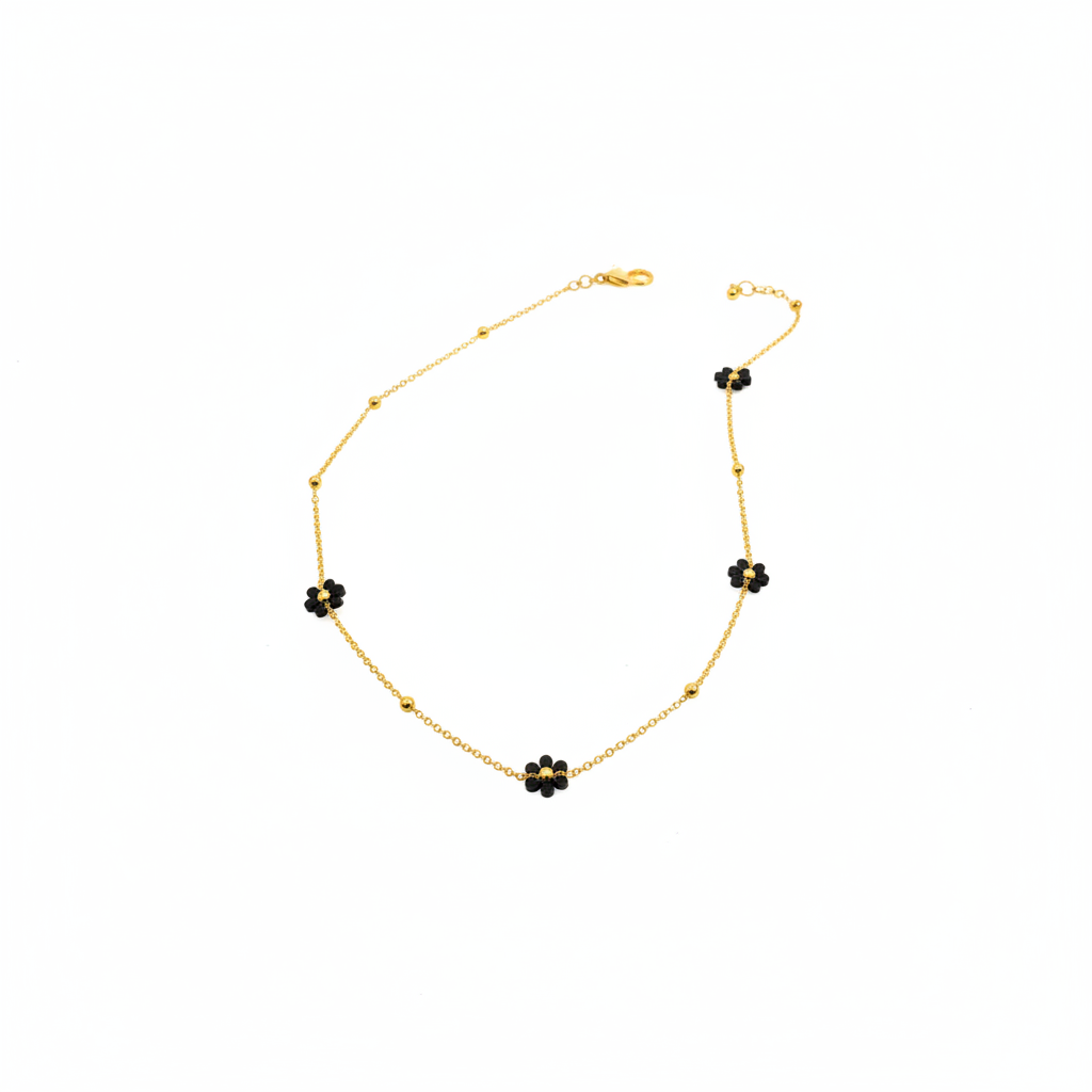 Collana fiori neri - catena oro sfondo bianco