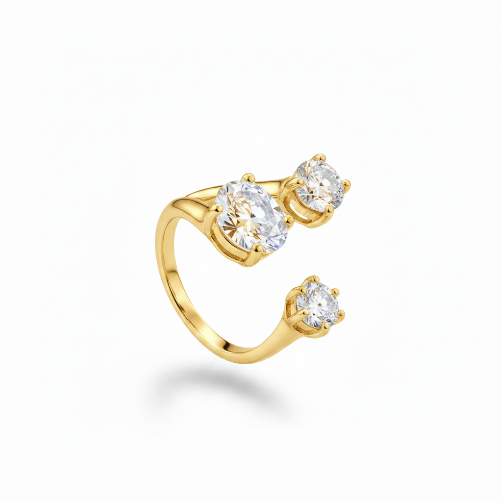 Gold three stone bypass ring