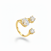 Gold three stone bypass ring