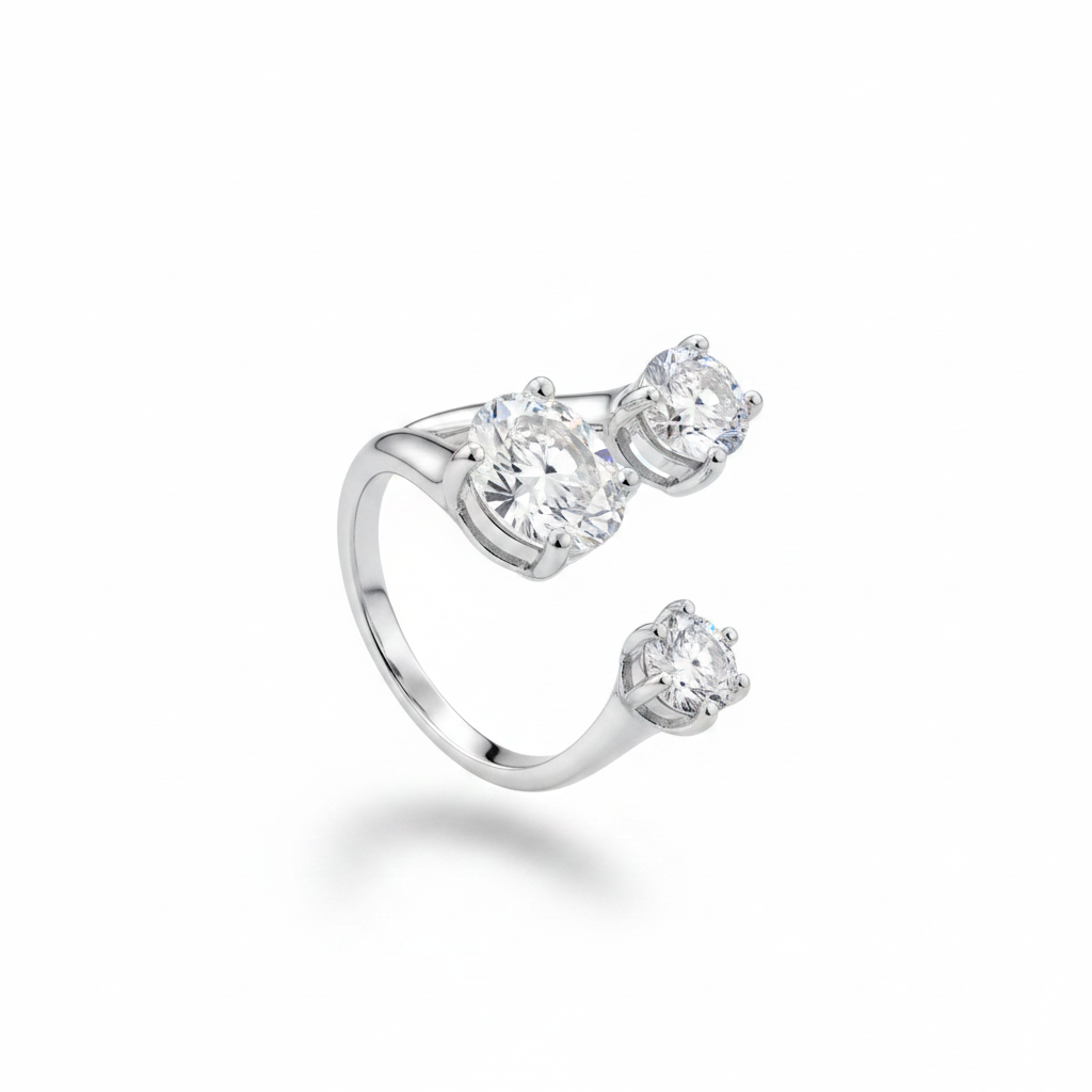 Silver three stone bypass ring