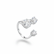 Silver three stone bypass ring